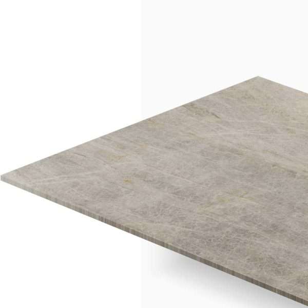 Corner view of a light gray marble countertop with subtle veining and a diagonal edge visible on a white background.