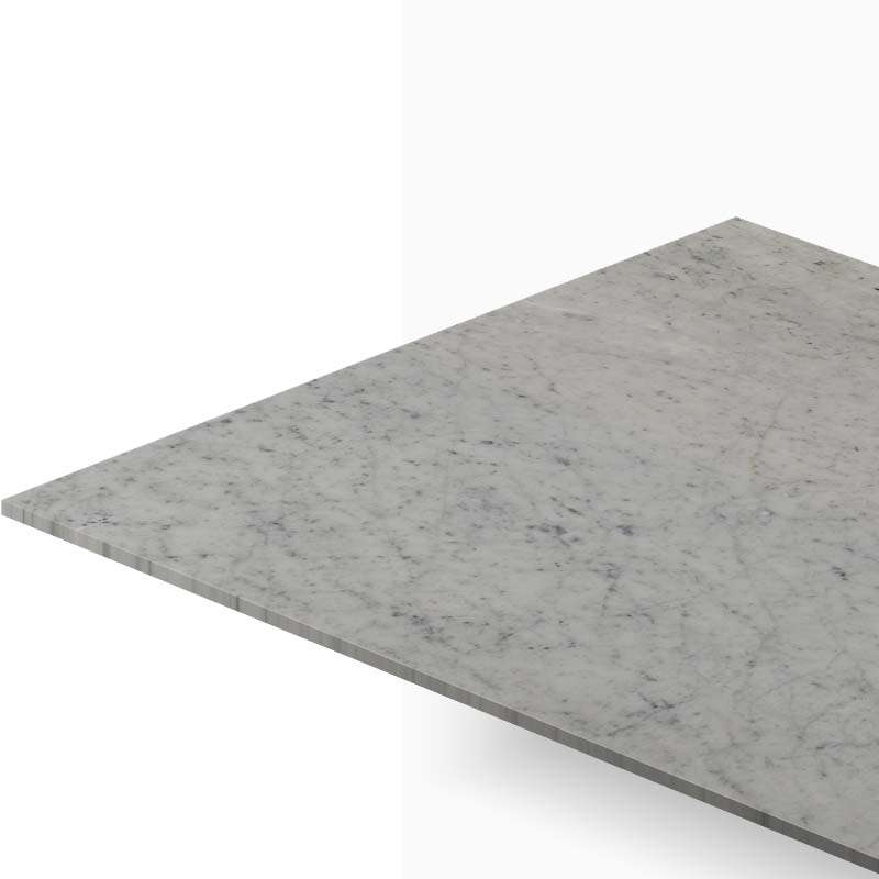 Close-up of a gray marble countertop edge extending diagonally across the image.