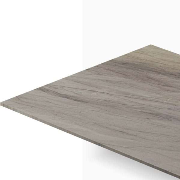 Angled view of a gray marble tabletop with subtle veining along the surface.