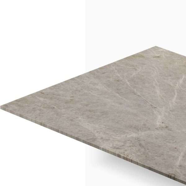 Diagonal perspective of a beige marble countertop slab against a white background.