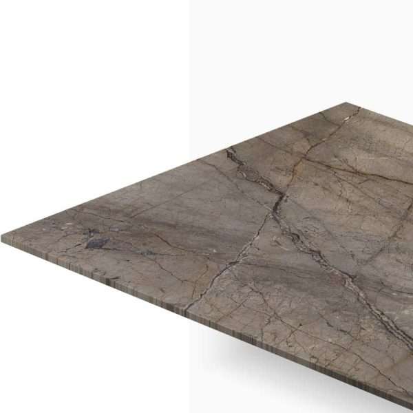 Corner view of a brown marble tabletop with dark veining and a clean edge edge visible.