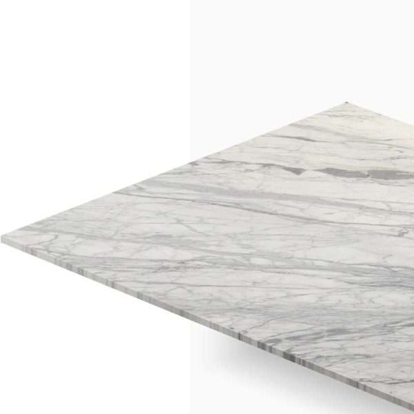 Perspective shot of a marble tabletop edge and corner with gray veining on a light background.