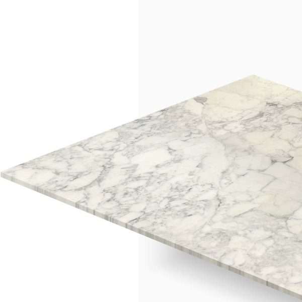 Diagonal view of a white marble countertop with gray veining, showing the edge and surface detail