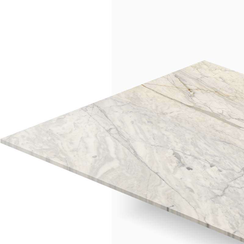 Angled view of a white marble countertop with gray veins and a straight edge edge to the left outside the frame.
