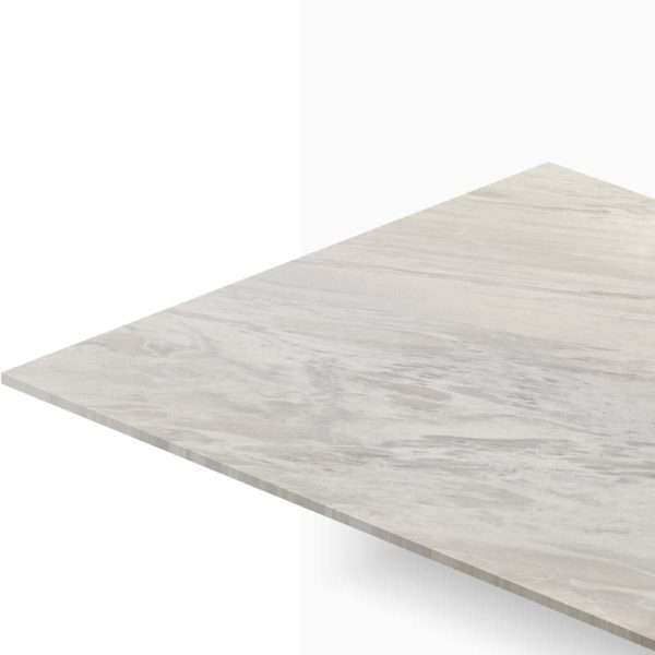 Light gray marble tabletop edge viewed from an angled perspective, showing subtle veining on a white background