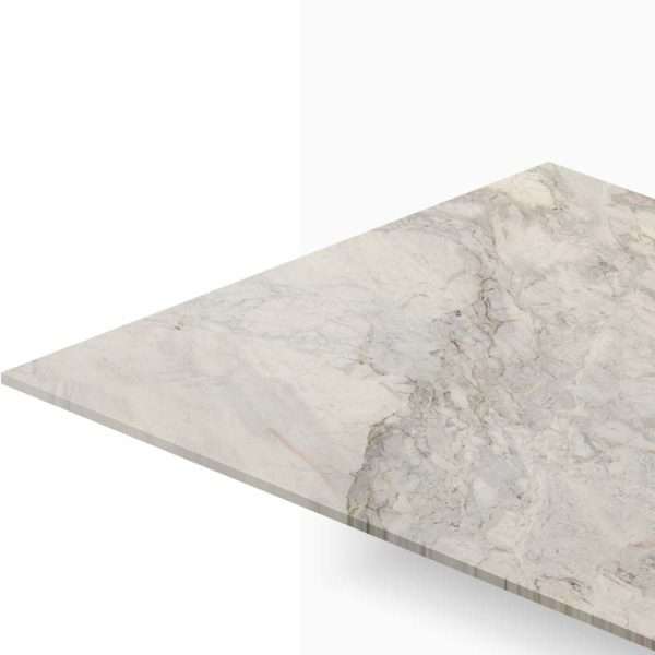 Close-up of a light gray marble countertop edge with natural veining, shown from an angled perspective.